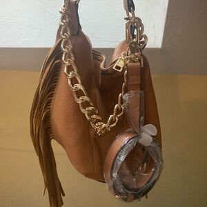 Steve Madden Leather Purse with shoulder and crossbody strap, tassel accessory